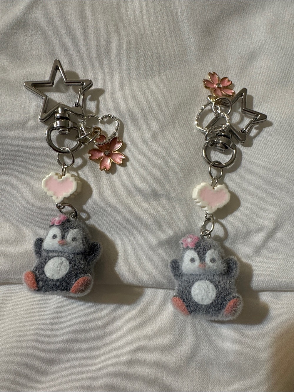 Source Unknown Gray Penguin Keychain Pair with Pink Flower Charms